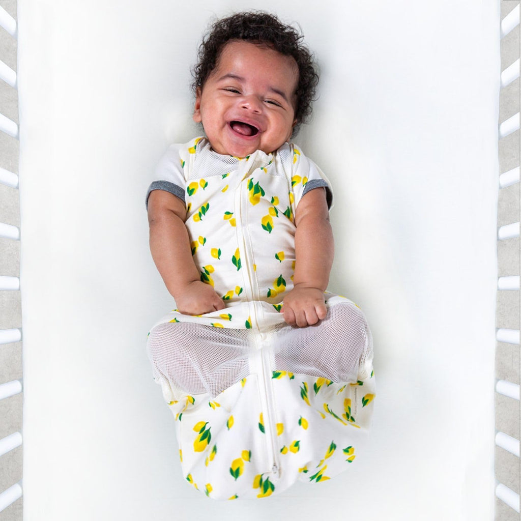 Happiest Baby Sleepea 5-Second Swaddle - 100% Organic Cotton Baby Swaddle Blanket - Doctor Designed Promotes Healthy Hip Development (Ivory Lemons, X-Large)