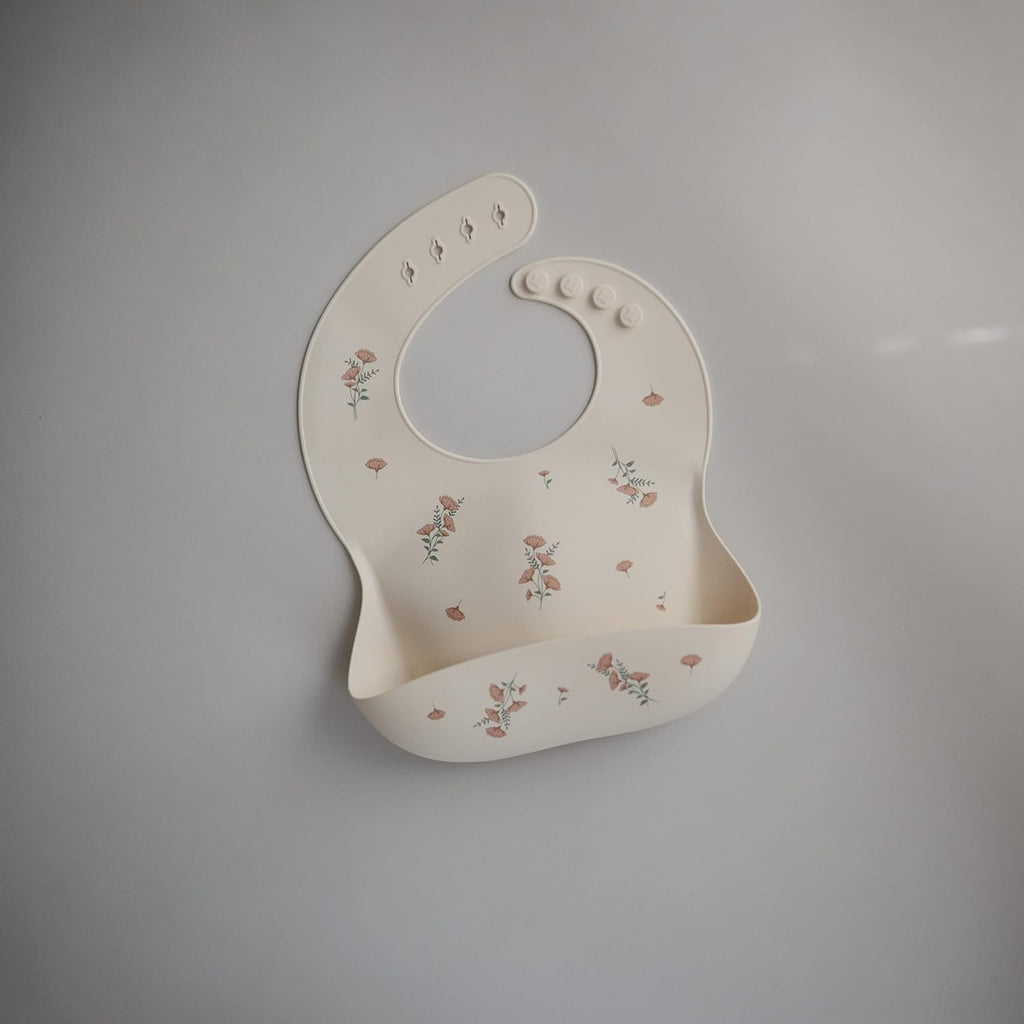 mushie Silicone Baby Bib | Adjustable Fit Waterproof Bibs (Pink Flowers)