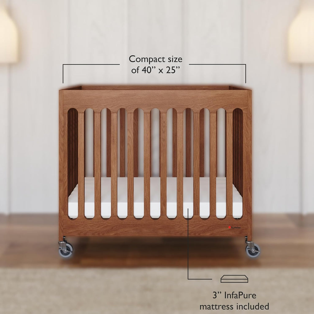 Foundations Boutique Folding Mini Baby Crib - Compact, Portable, Wooden Hotel Crib, Foldable Compact Cribs for Baby & Toddlers - Includes 3" Foam Mattress - Cherry