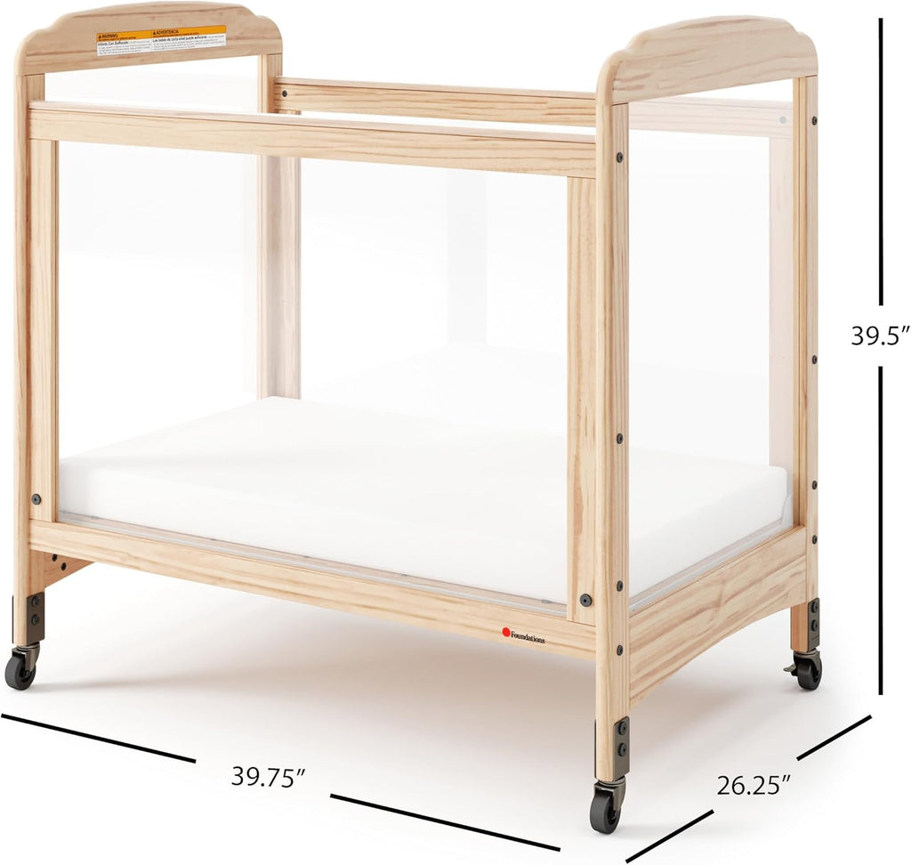 Foundations Serenity Compact Clearview Daycare Crib, Fixed Side, Durable Wood Construction, Non-Marking Casters (2 Locking), Includes 3” InfaPure Foam Mattress (Natural)