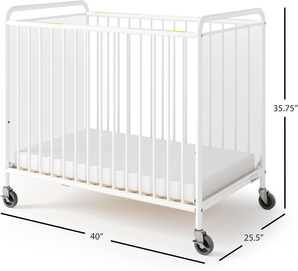 Foundations Chelsea Clearview Metal Compact Daycare Crib, 3" Casters, Compact Mini Size, Easy to Clean Durable Finish, Adjustable to Two Heights Mattress Board (White)