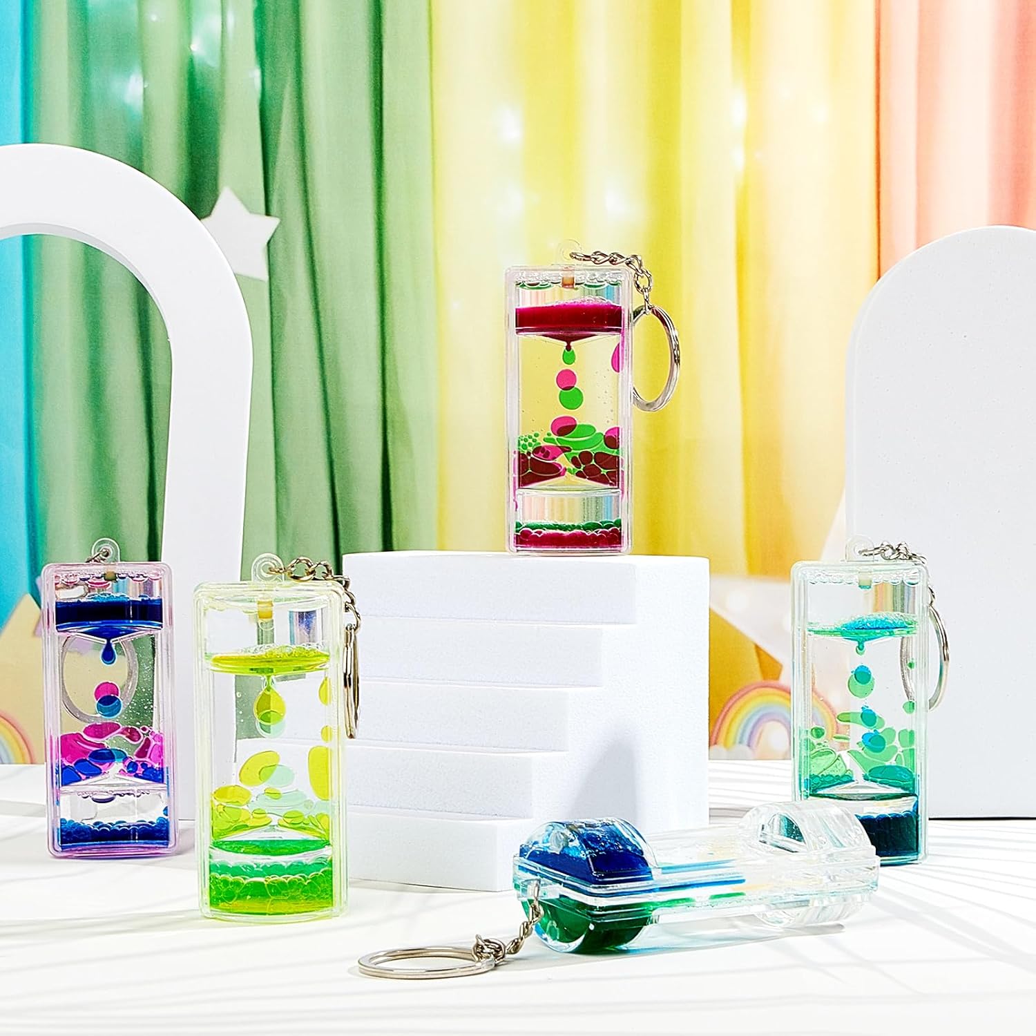 12 Pcs Liquid Motion Bubbler Keychains, Liquid Motion Bubbler Sensory Toys Liquid Keychain Fidget Keychain for Adults Stress Relief Gifts Calming Toys Party Favors Bag Pendant, 4 Styles