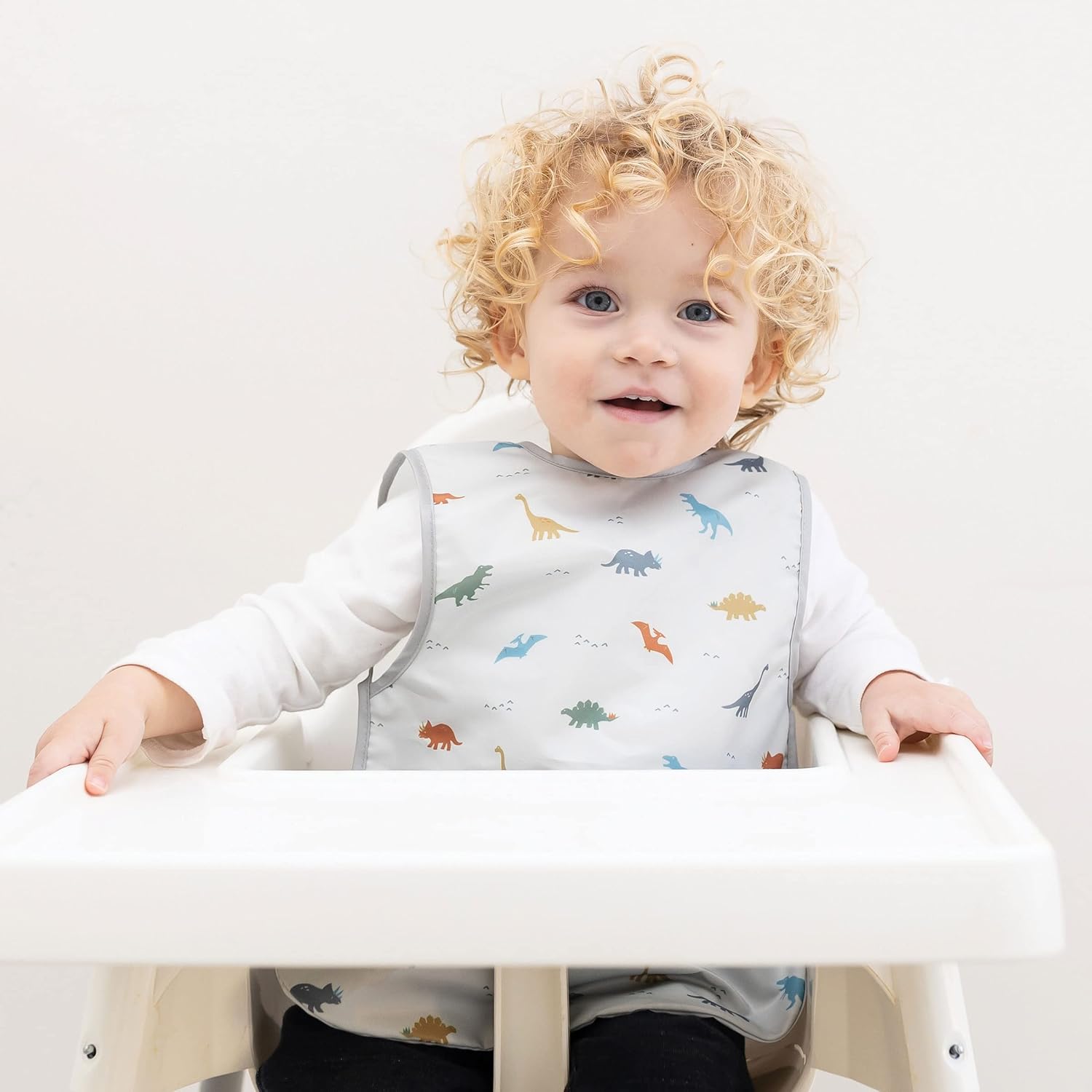 Tiny Twinkle Mess Proof Baby Bib - Waterproof & Lightweight Baby-Led Weaning Apron | 100% Recycled Polyester, Easy Clean & Machine Washable (Dinosaur, Small 6-24 Months)