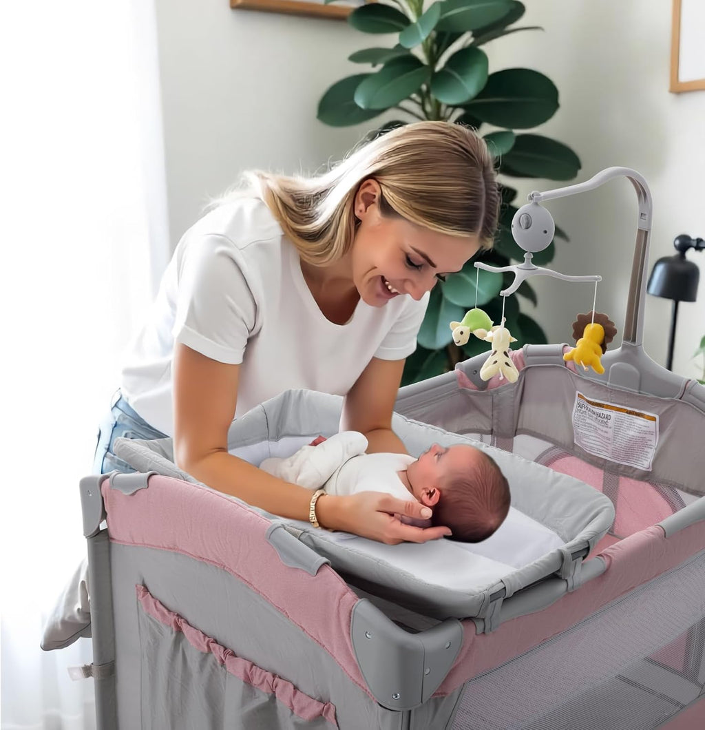 5 in 1 Baby Crib,Bedside Sleeper,Bassinet,Pack and Play with Bassinet and Changing Table,Portable Travel Playpen Music Box,Portable Travel Crib for Infant Newborn (Pink Gray)