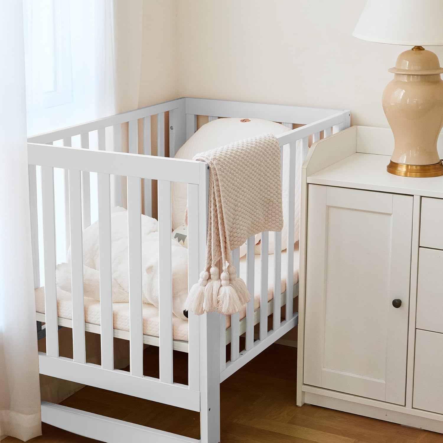 EvoNest Baby Crib, 11 in 1 Convertible Mini Crib with Wheels, 100% New Zealand Wood Growing Bed, 4 Adjustable Mattress Height,White