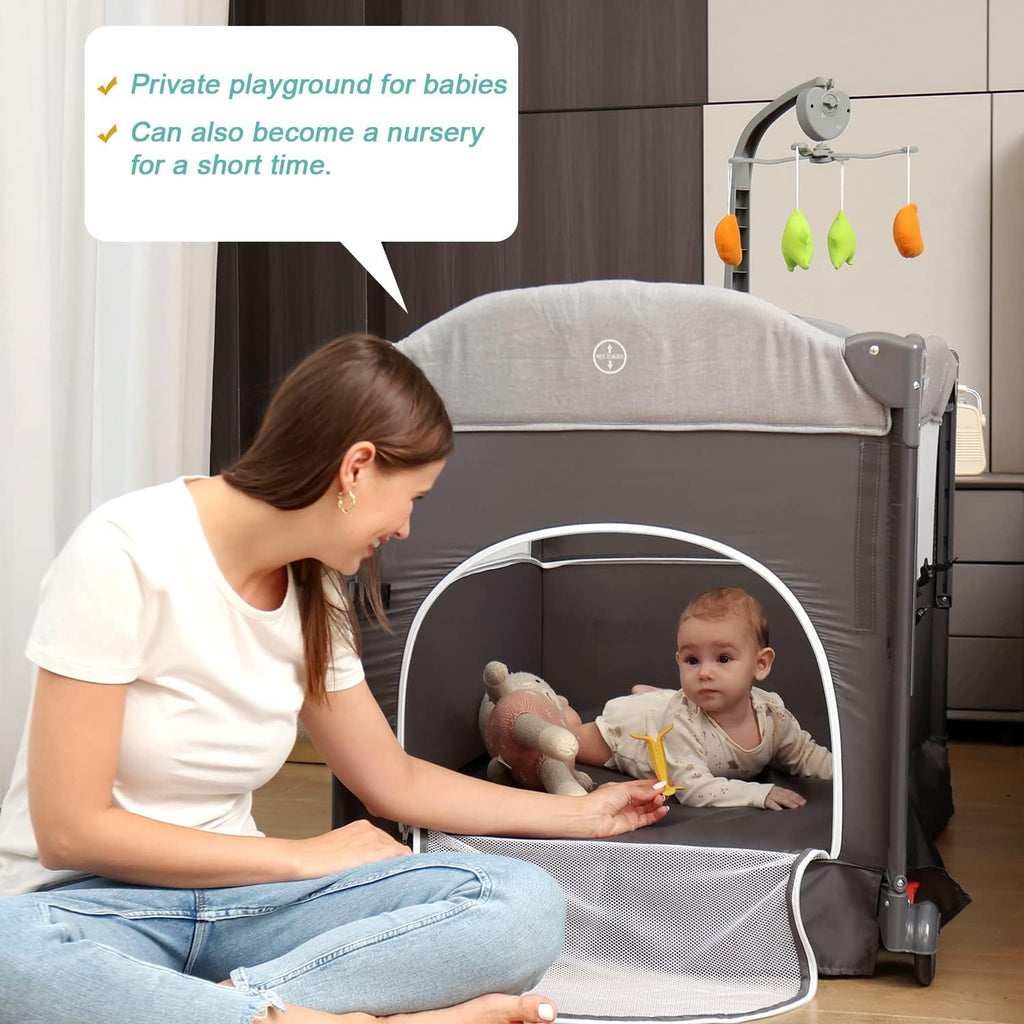 Zdolmy Baby Bedside Sleeper Bassinet, 4-in-1 Pack and Play with Bassinet w/Diaper Changing Table & Storage Bag, 3 Adjustable Heights, Toy Arch & Music, Portable Baby Play Yard with Carry Bag