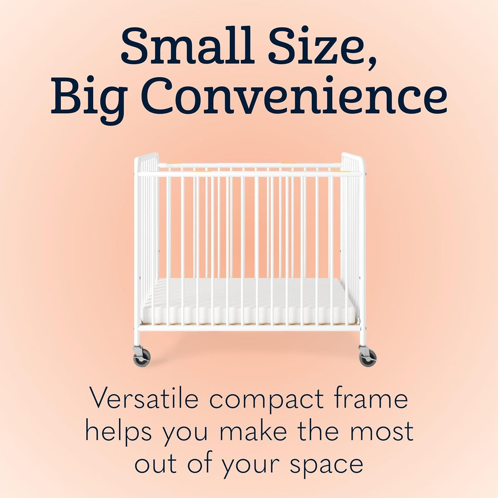 Foundations Chelsea Slatted Metal Compact Daycare Crib, 3" Casters, Compact Mini Size, Easy to Clean Durable Finish, Adjustable to Two Heights Mattress Board (White)