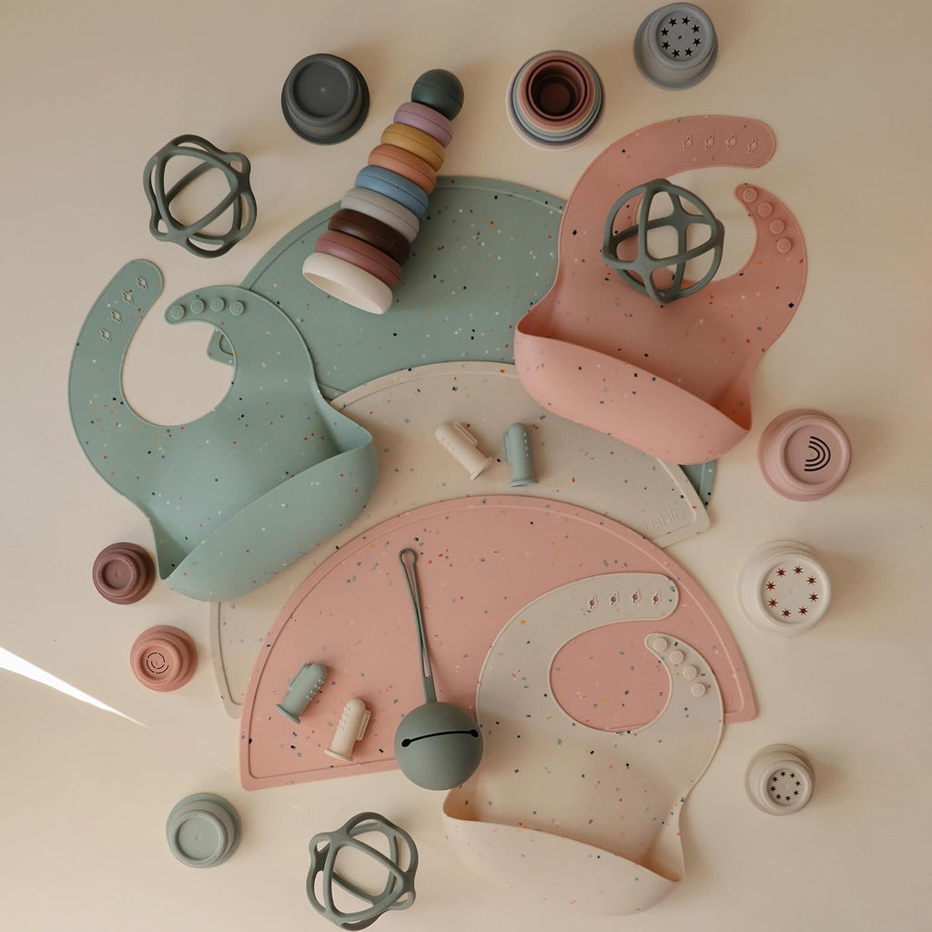 mushie Silicone Baby Bib | Adjustable Fit Waterproof Bibs (Cambridge Blue Confetti)